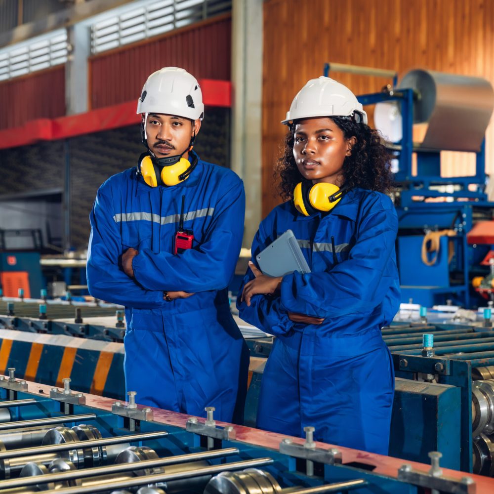 Foreman or worker work at factory site check up machine or products in site. Engineer or Technician checking Material or Machine on Plant. Industrial and Factory.